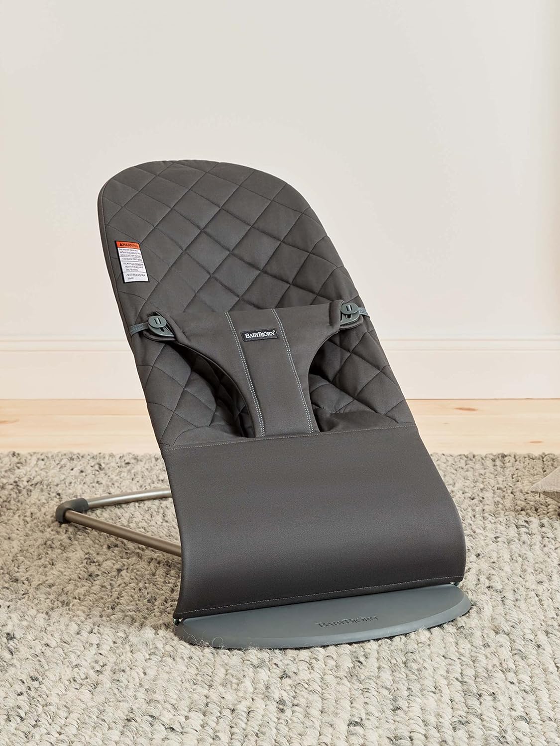 BabyBjörn Bouncer Bliss reversible-seat to chair mode closeup shows transformation.