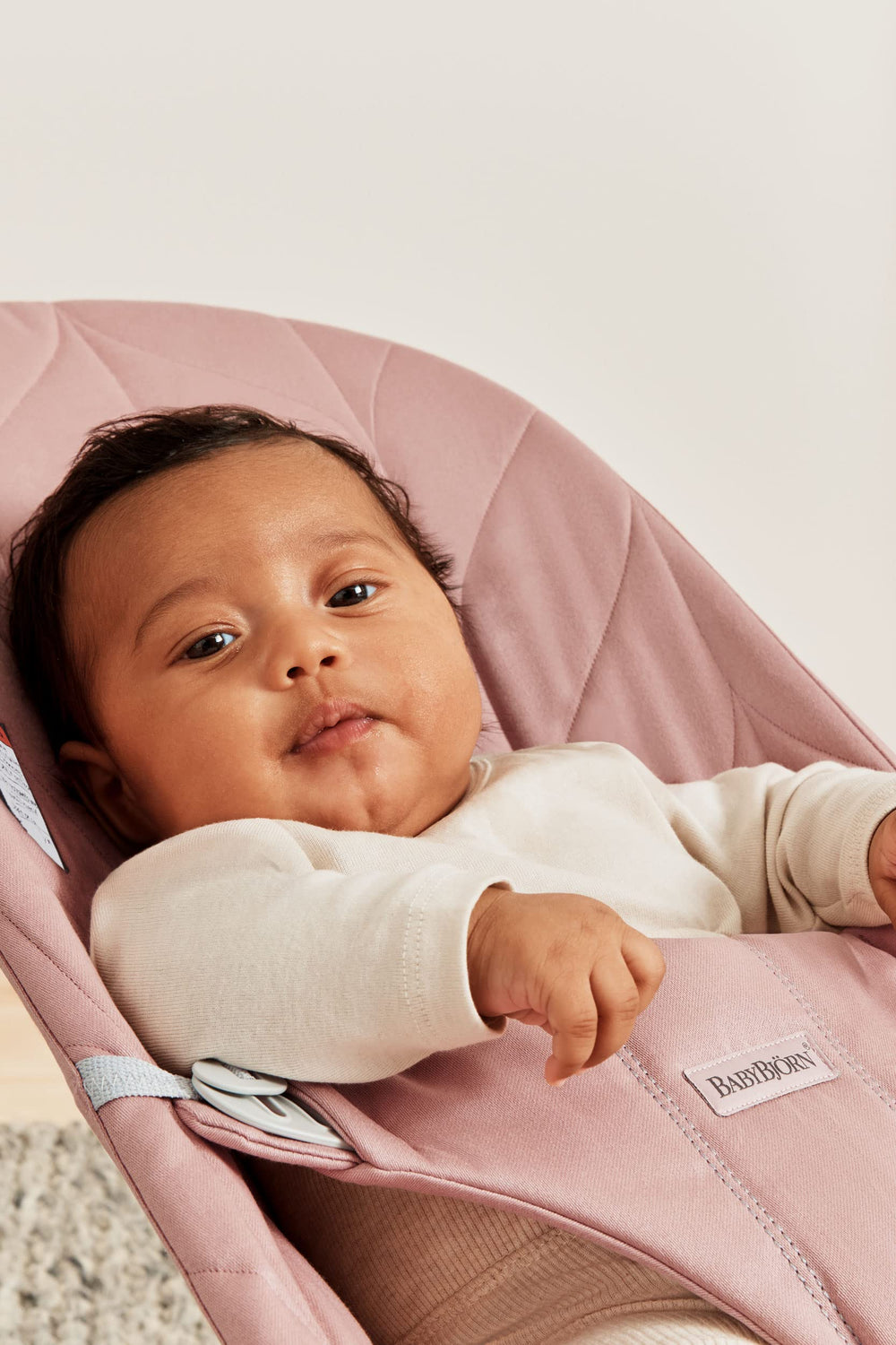 BabyBjörn Bouncer Bliss folded flat for storage and space saving.