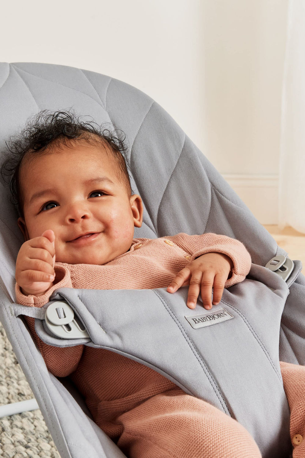 BabyBjörn Bouncer Bliss in-use shot with baby enjoying soothing rocking motion.