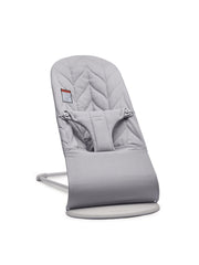 BabyBjörn Bouncer Bliss with light gray frame offering close, hands-free moments.