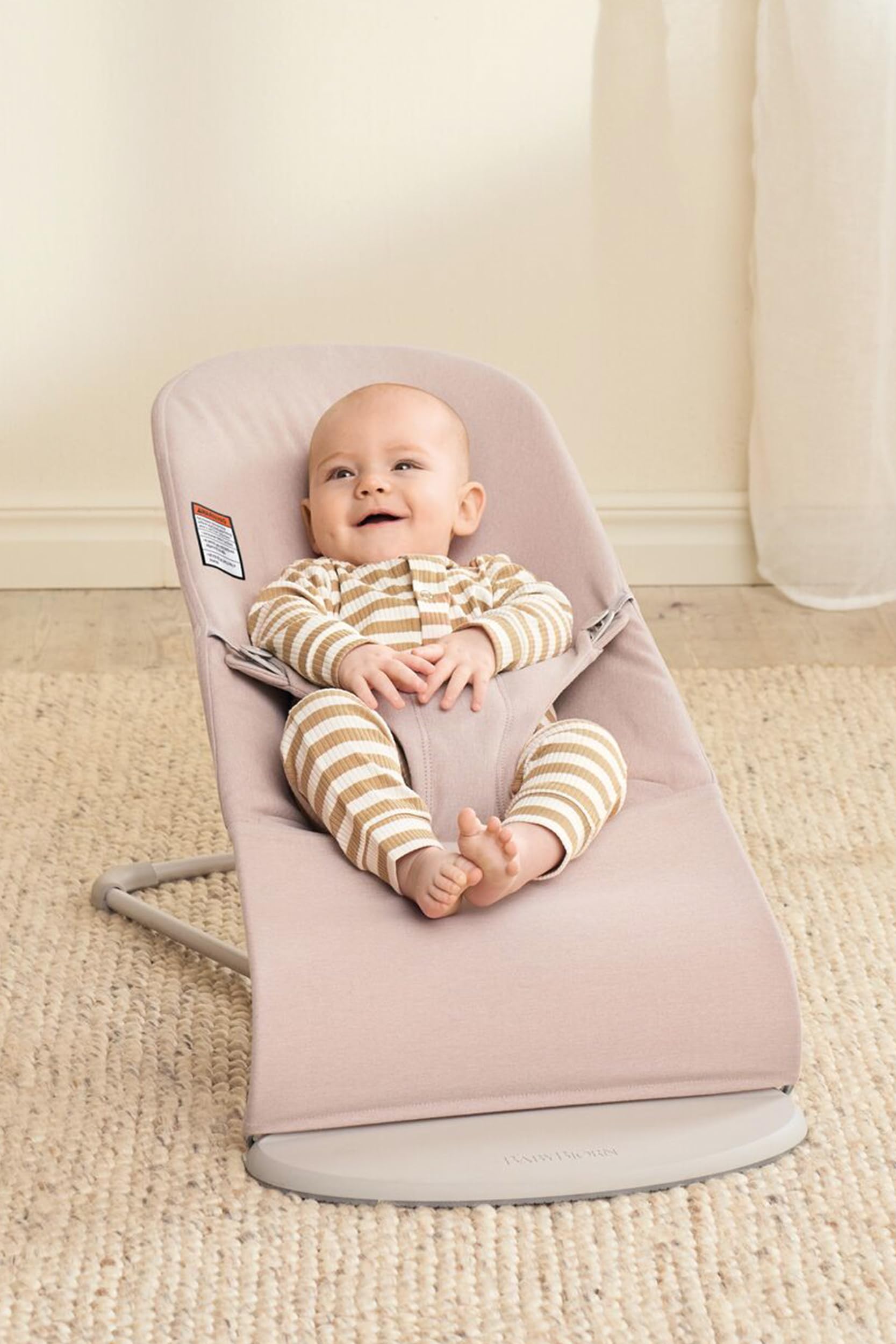 BabyBjörn Bouncer Bliss harness on, safety harness for secure bouncer use.