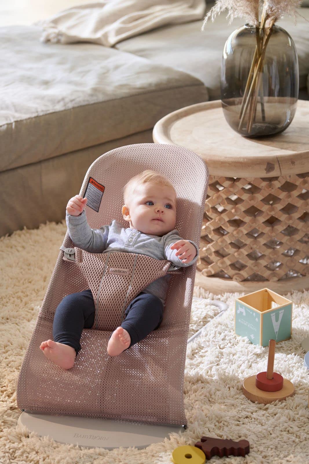 BabyBjörn Bouncer Bliss Mesh Dusty Pink side-adjustment shows three seating positions.
