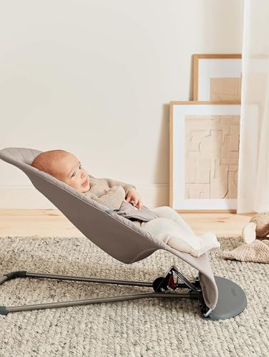 Close-up of safety harness on BabyBjörn Bouncer Bliss sand gray for secure use.