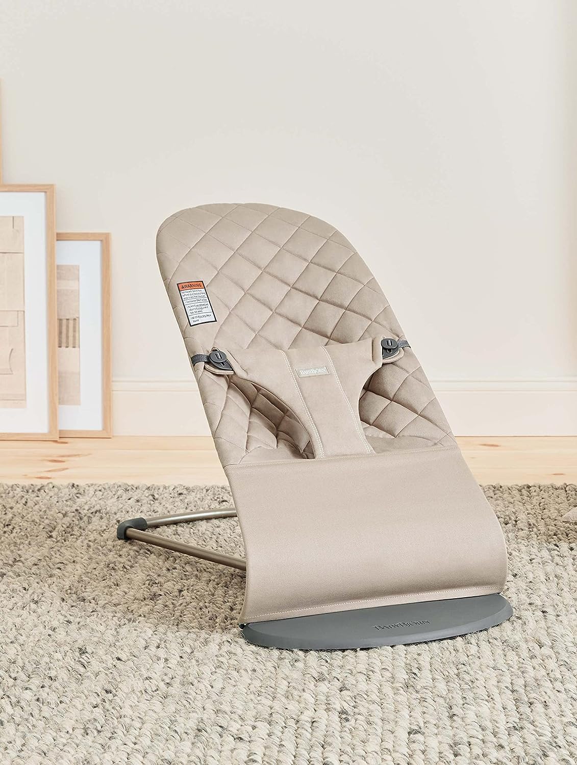 Toy attachment area on BabyBjörn Bouncer Bliss sand gray for baby playtime.