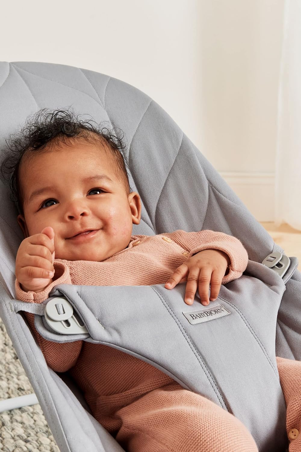 Soft mesh fabric on BabyBjörn Bouncer Bliss enhances airflow for comfort.