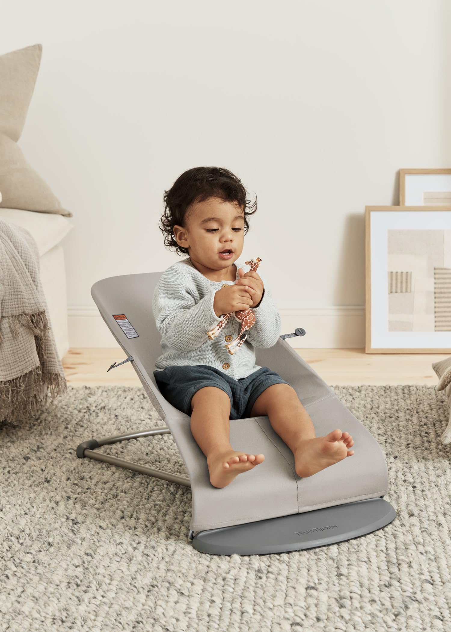 BabyBjörn Bouncer Bliss woven fabric close-up emphasizes durable, gentle-touch seating for everyday use.