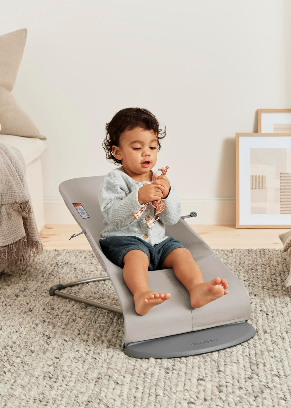 BabyBjörn Bouncer Bliss woven fabric close-up emphasizes durable, gentle-touch seating for everyday use.