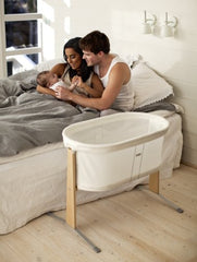 BabyBjörn cradle white mesh side view highlights breathable fabric.