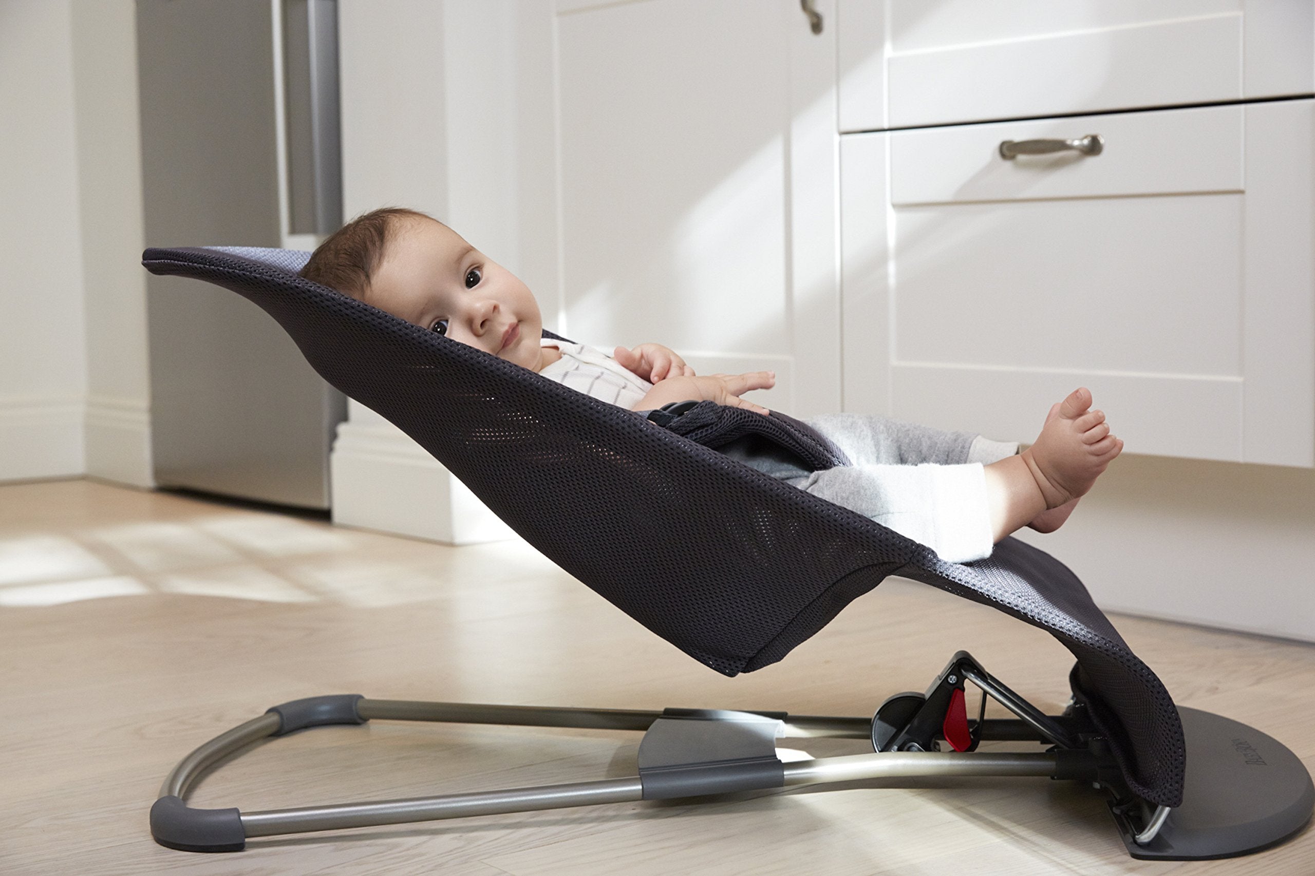 Fabric seat is machine washable for busy parents.