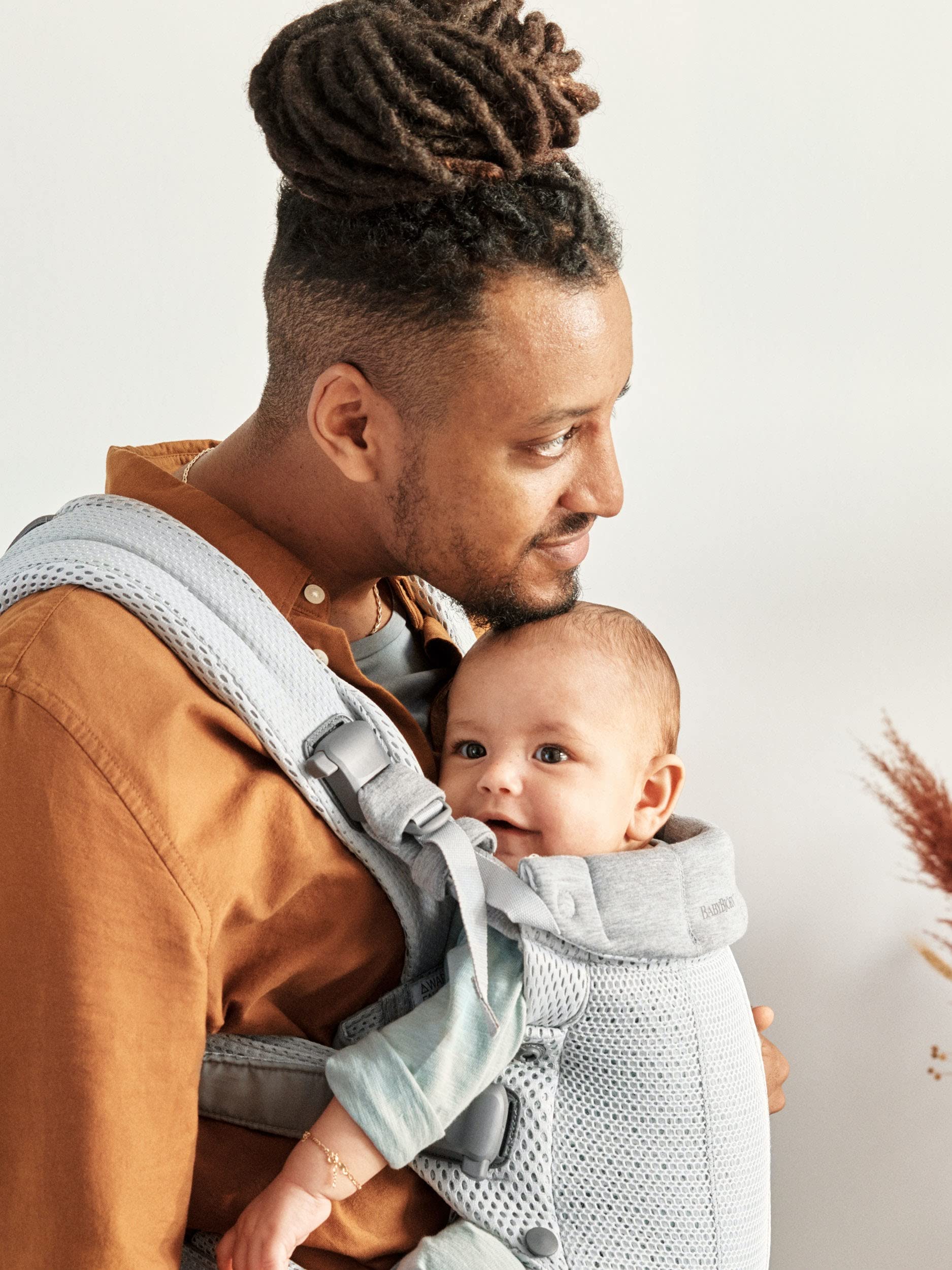 Back carry option frees hands for activities and chores