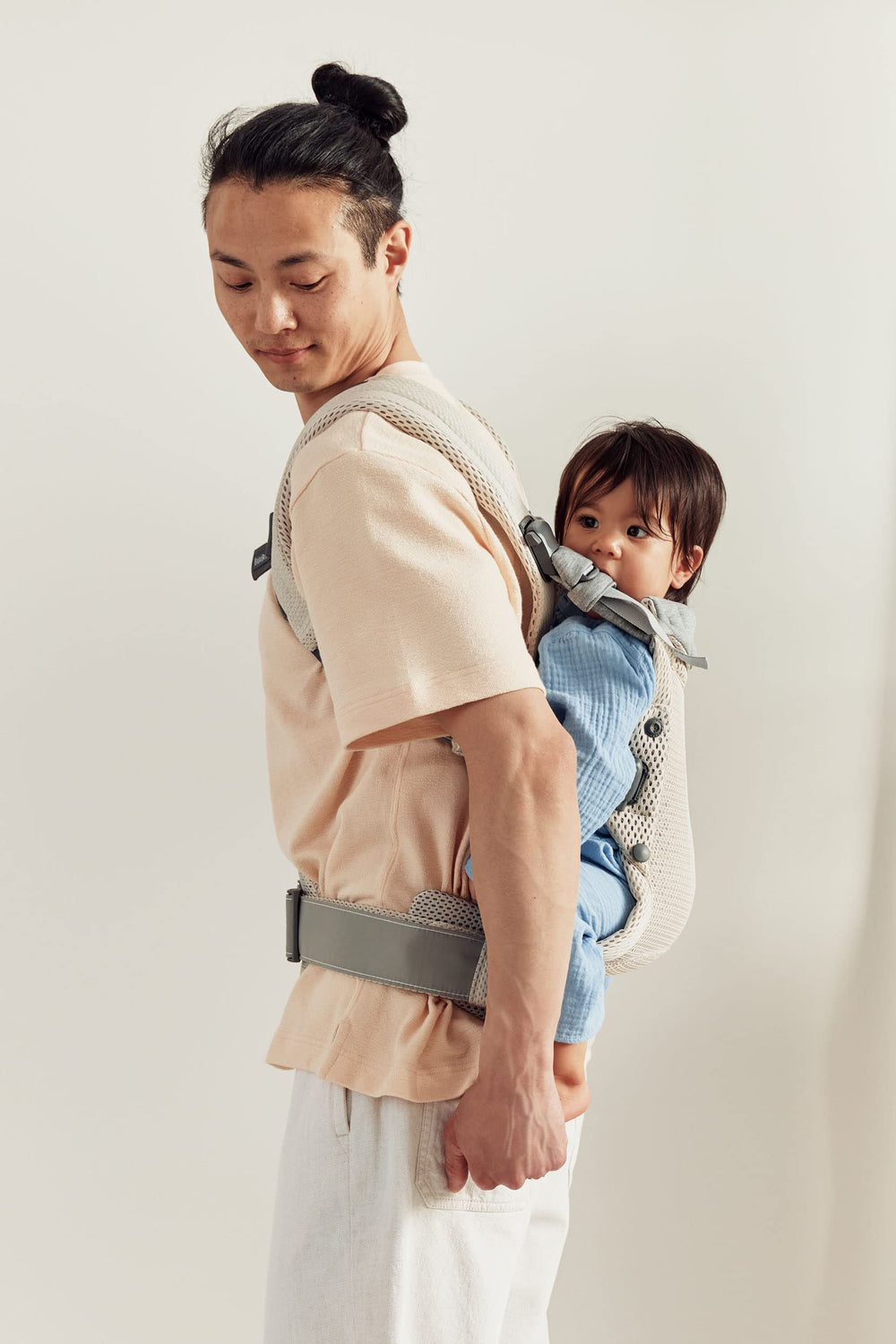 BabyBjörn Harmony back carry mode shows versatile transport for active parents