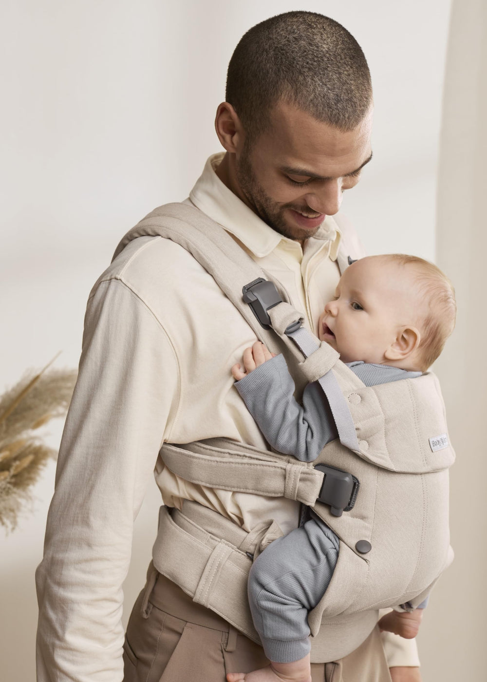 Newborn-facing-in use of harmony showing closeness and secure support for tiny infants