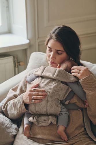 BabyBjörn Mini ergonomic support keeps parent and baby comfortable.