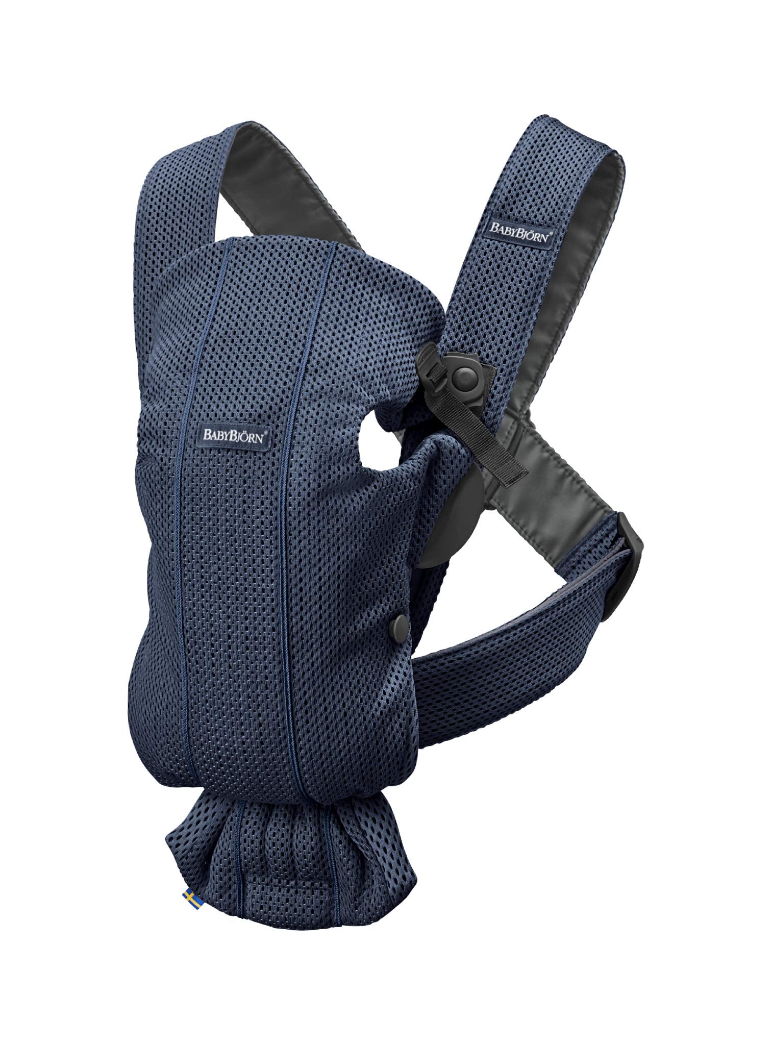 BabyBjörn Mini navy blue 3D mesh carrier supporting newborn closeness and ergonomic position.