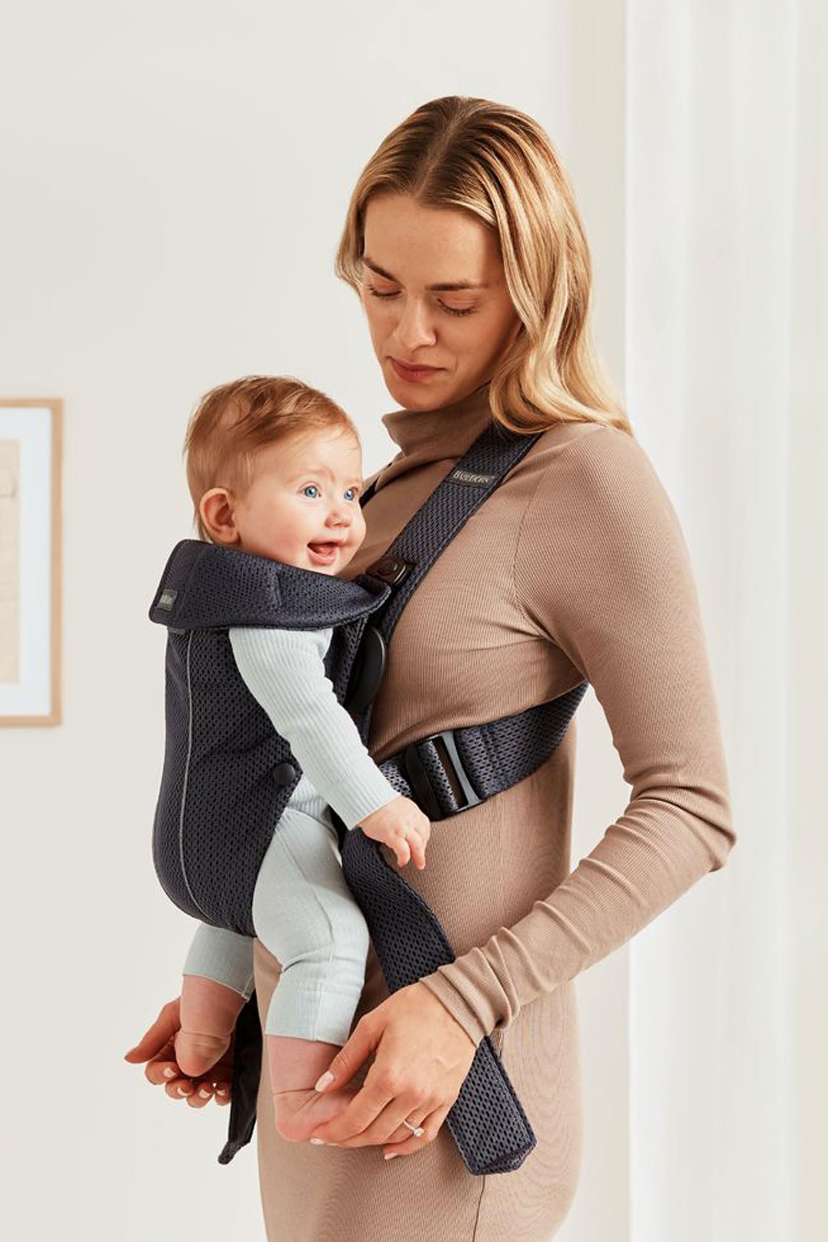 BabyBjörn Mini newborn snug-fit demonstrating secure position
