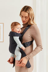 BabyBjörn Mini newborn snug-fit demonstrating secure position