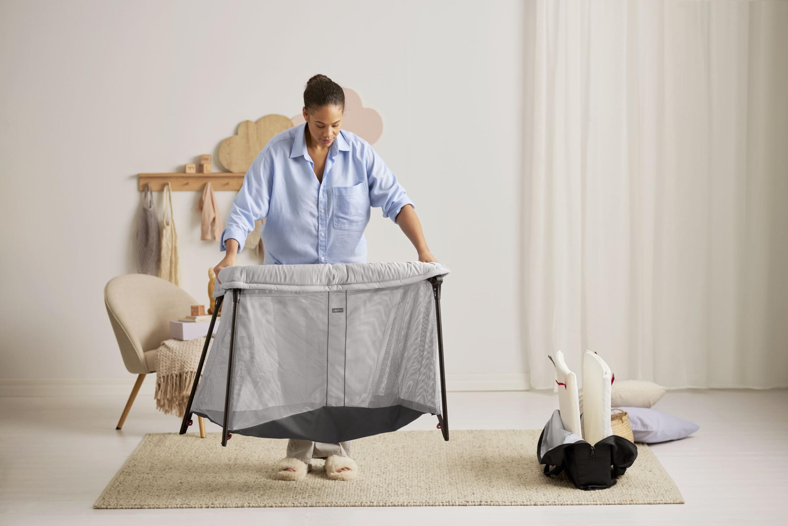 BabyBjorn Travel Crib Light portable option ideal for hotel stays.