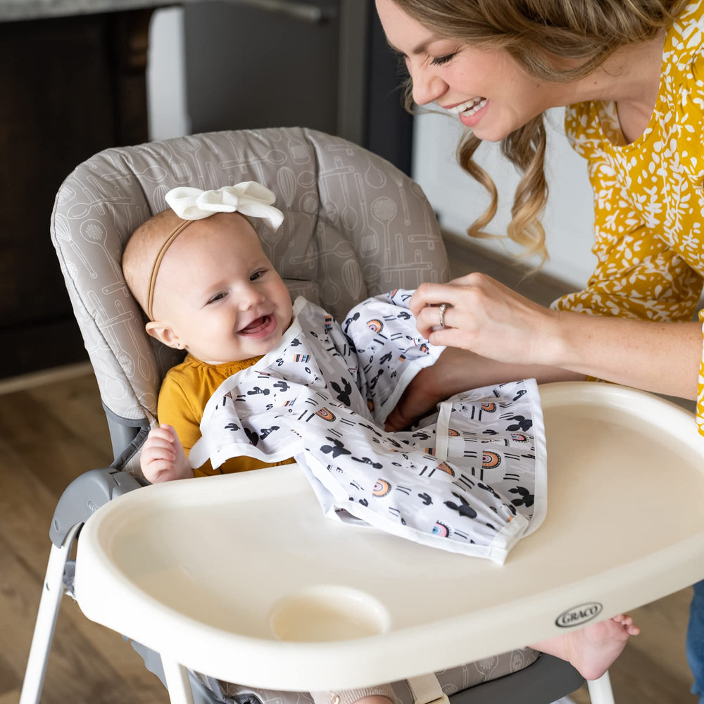 BABYBOET waterproof smock with sleeves complements mat protection
