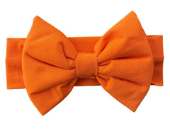 BABYGIZ orange big-bow headband for 0-6 months babies keeps hair away from the face.