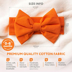 BABYGIZ stretchy cotton bow headband provides secure, comfortable fit for 0-6 months.