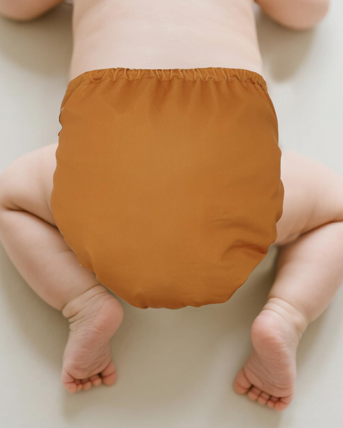 Babygoal waterproof diaper cover prevents leaks and keeps clothes dry