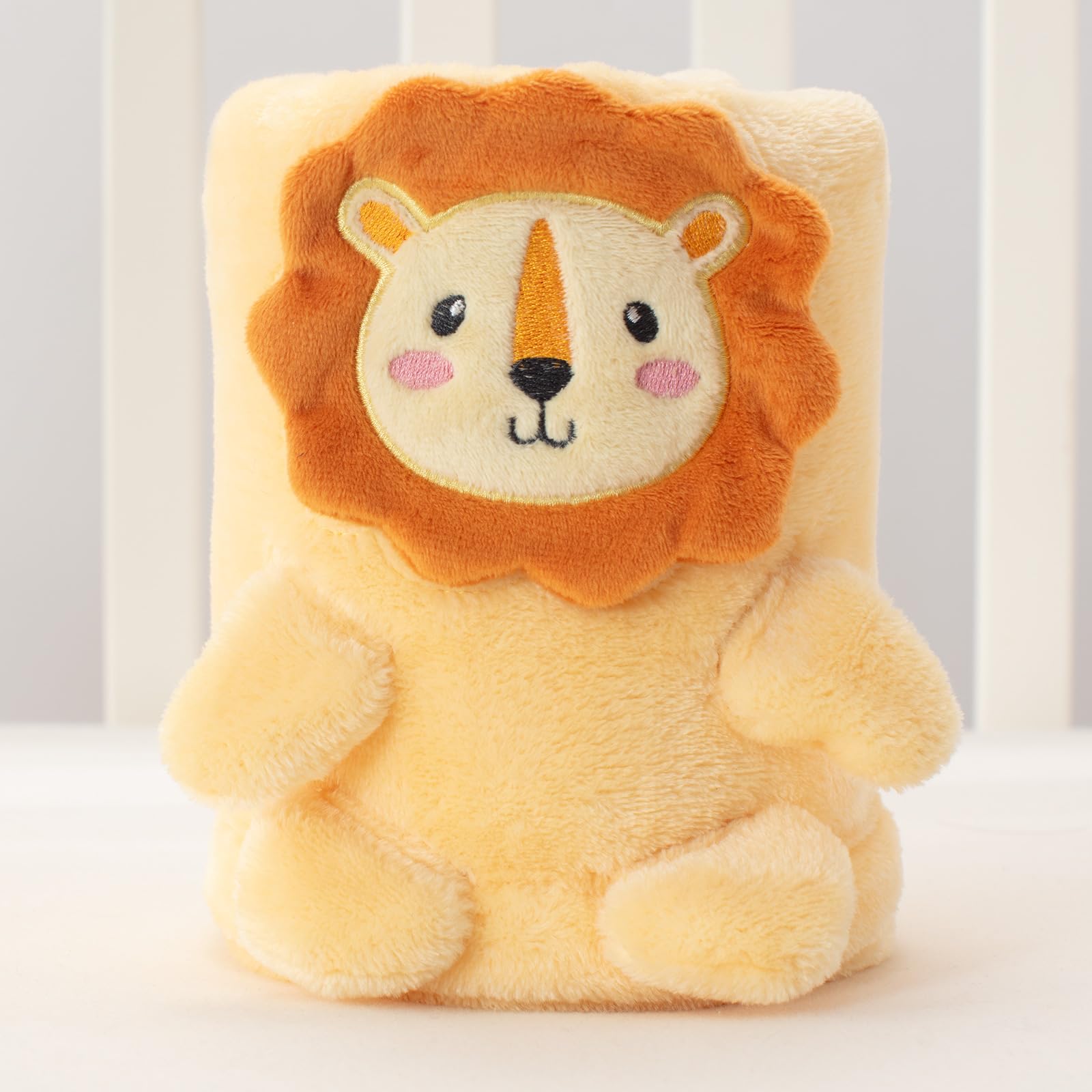 Babyhuggle bear shape blanket doubles as a cozy swaddle prop.