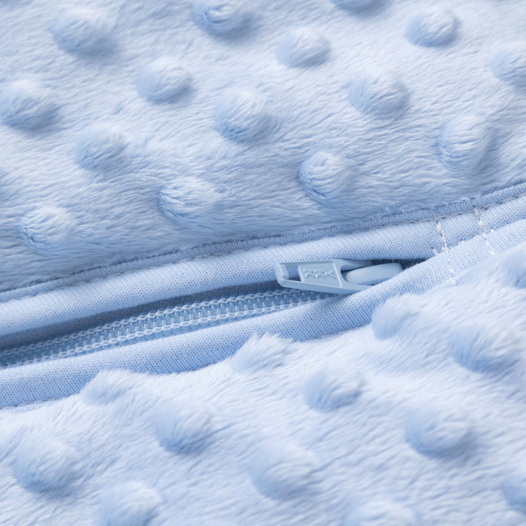 Front zipper facilitates easy diaper changes without waking the baby.