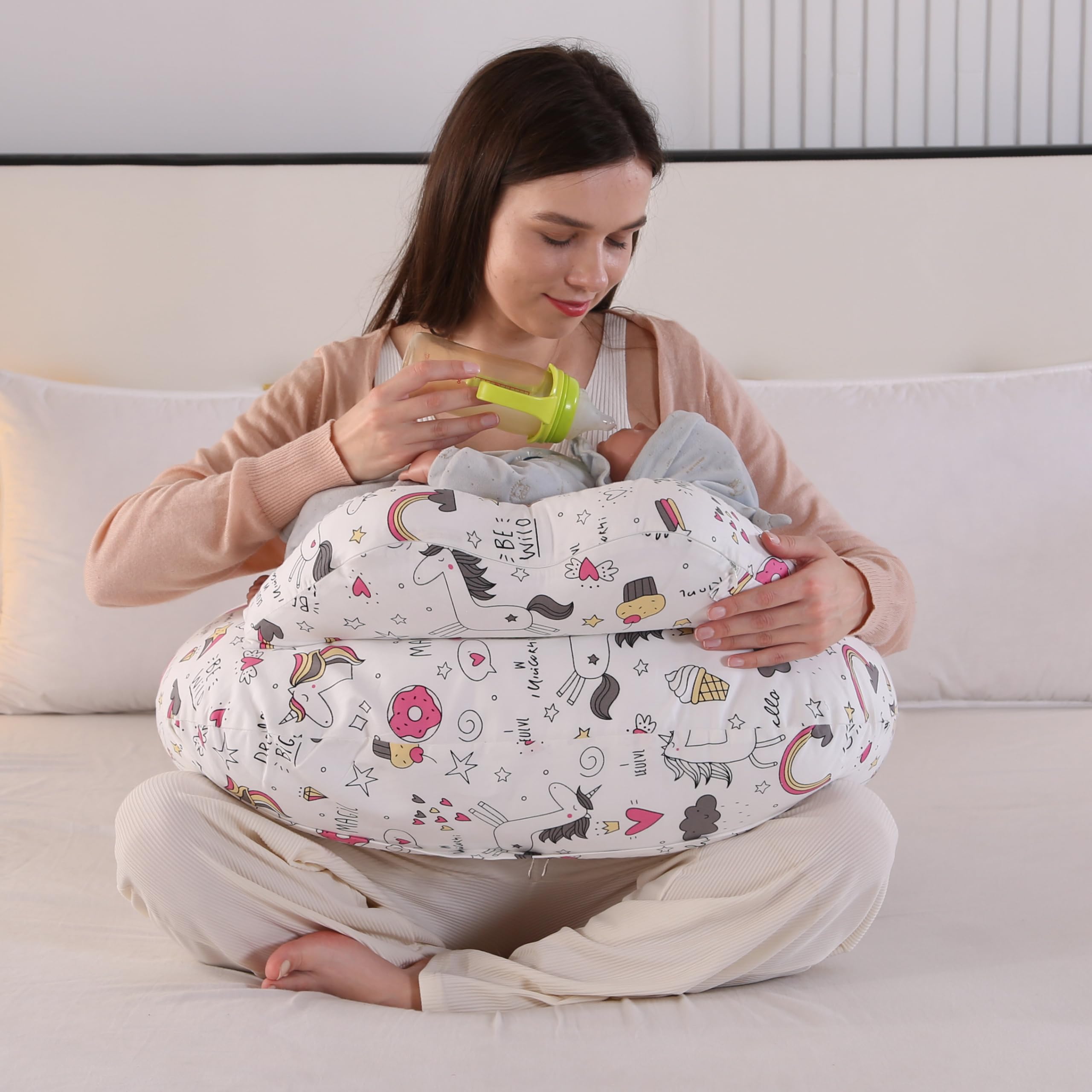 BABYLIAN nursing pillow with ergonomic design promotes comfortable feeding for mom and baby