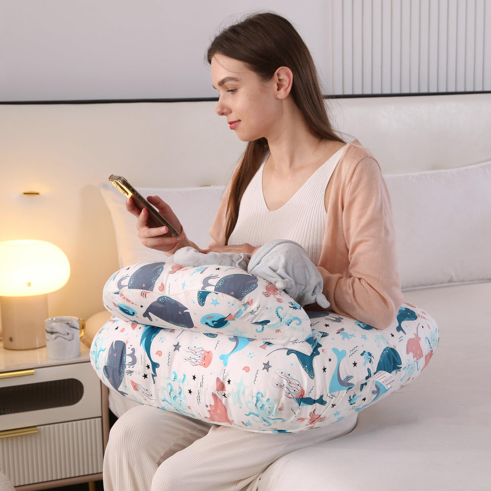 BABYLIAN multi-use pillow supports feeding, propping, tummy time.
