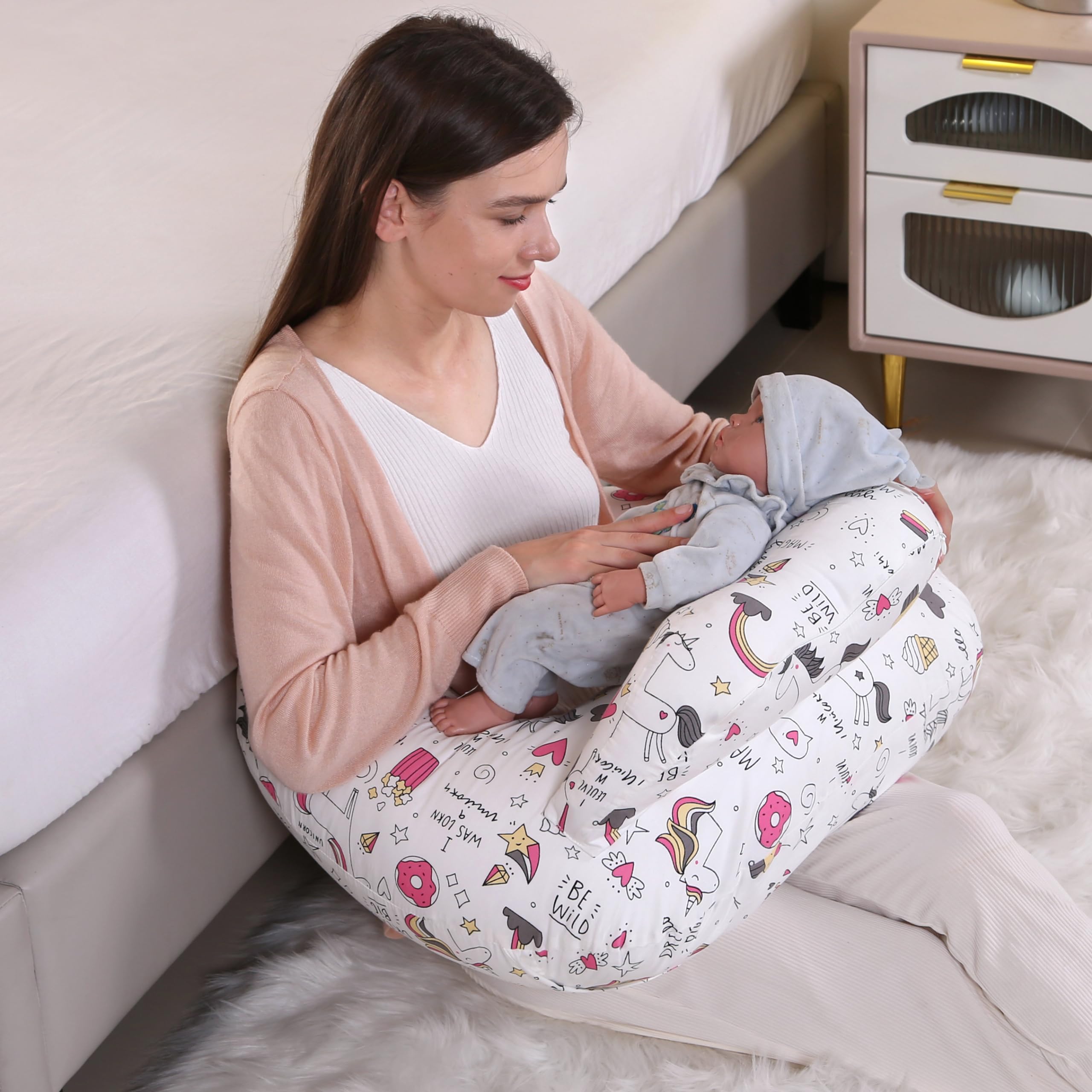 BABYLIAN nursing pillow with widened sides providing fuller arm support