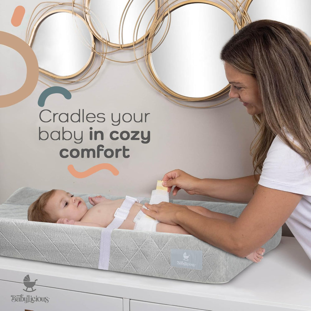 Babylicious sandy beige pad adds subtle style to the changing area.