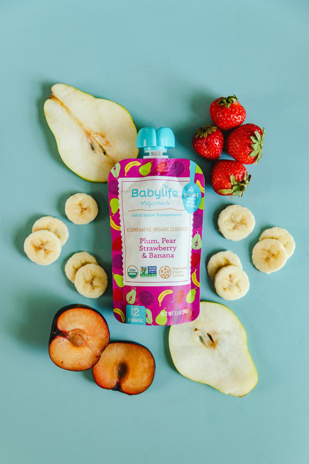 Babylife Organics Stage 2 ingredients closeup highlighting regenerative farming and vibrant fruit