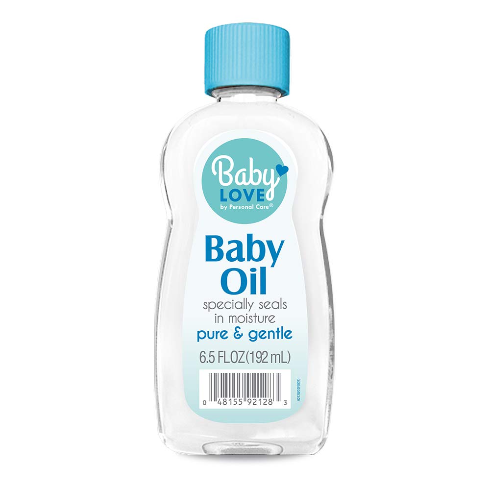 Babylove Sleepy Nights baby oil bottle — locks in moisture on damp skin.