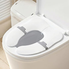 Babylush anti-pinch foldable travel potty seat on toilet showing quick setup.