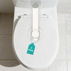 Babylush Baby Toilet Lock 2 Pack on lid for safe bathroom use.