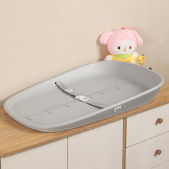 Babylush wipeable changing pad on dresser for clean, quick diaper changes.
