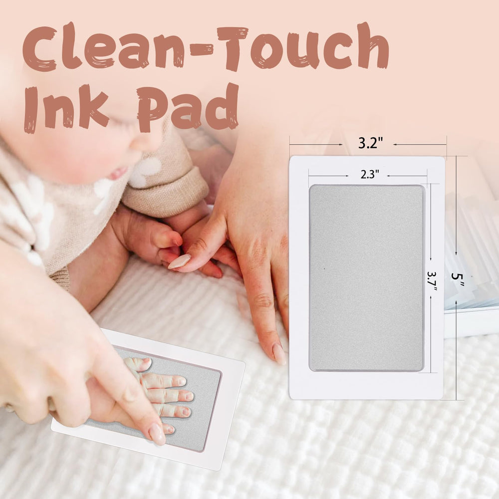 Newborn handprint on card using BabyQunt inkless kit for a clear keepsake