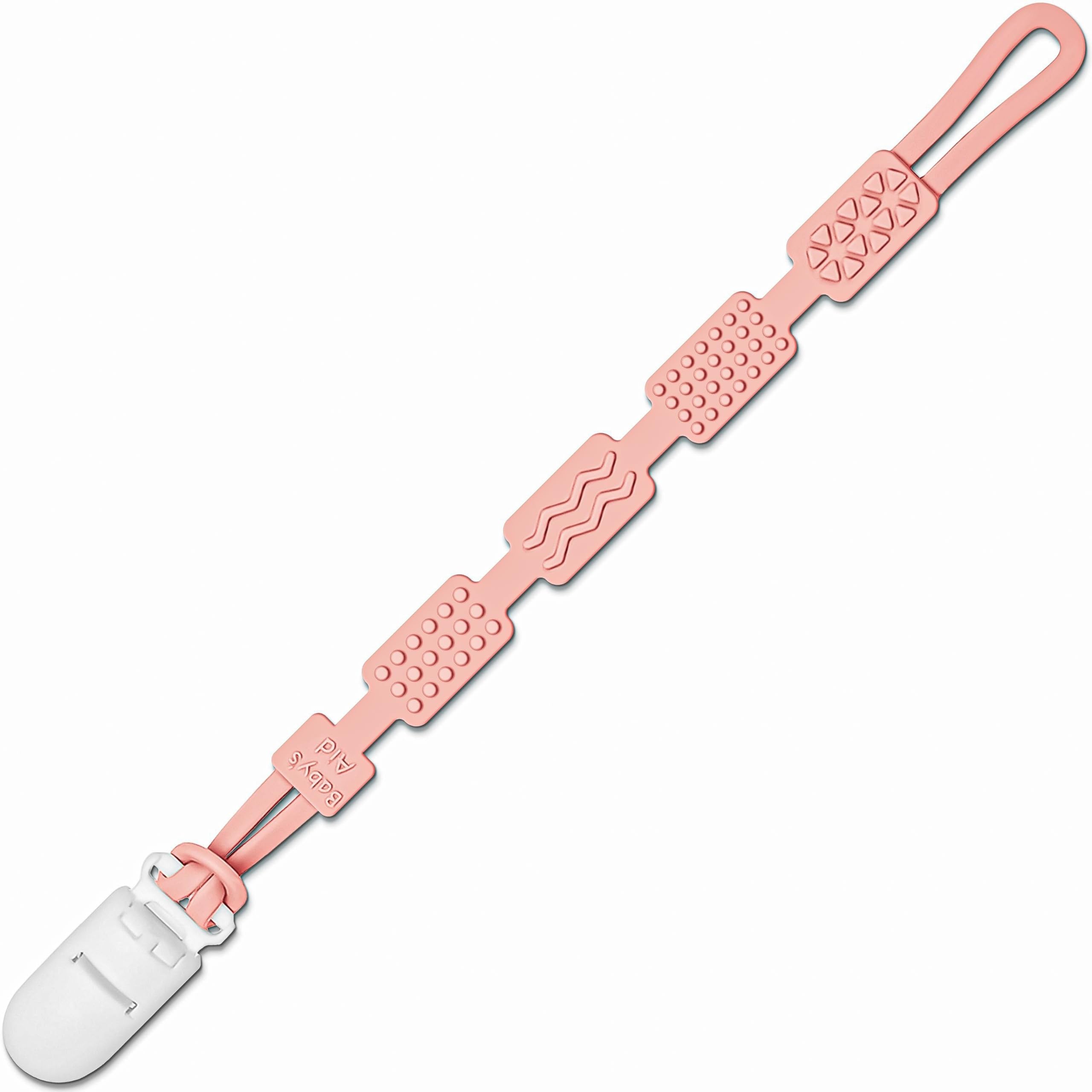 Baby's Aid silicone pacifier clip with four textures for on-the-go teething comfort.