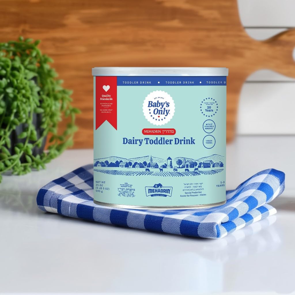 Baby's Only Organic dairy toddler drink dissolving in cup for smooth texture and easy feeding.