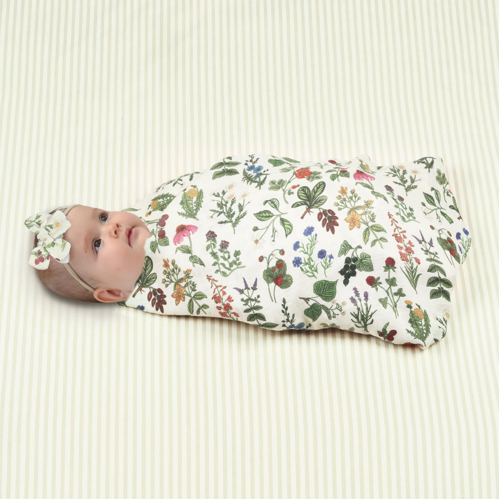BabyWhale swaddle blanket full view with wildflower print, ideal for everyday swaddling.