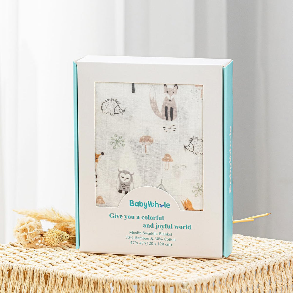 BabyWhale swaddle set with hat and bow headband for adorable wear