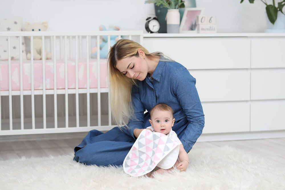 BaeBae Goods burp cloths newborn use demonstrates broad coverage during feeds