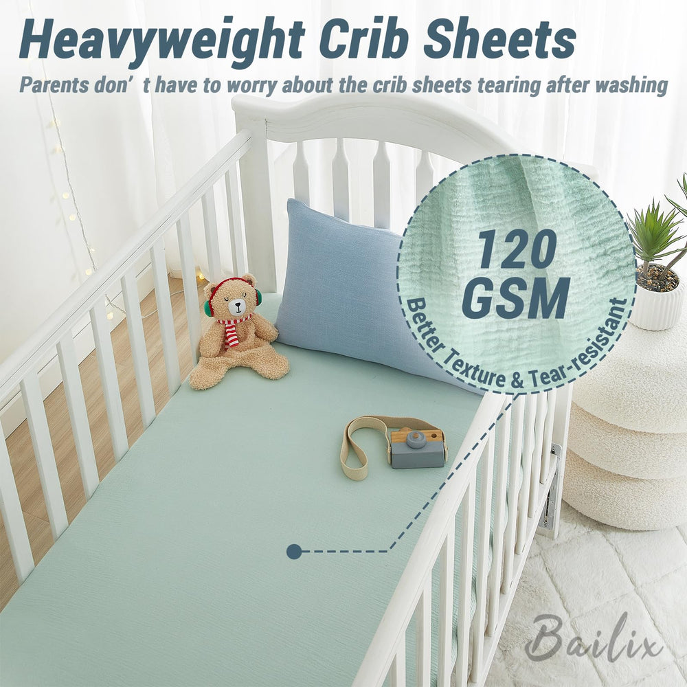 Bailix neutral crib sheet complements nursery decor with snug fit.