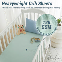 Bailix neutral crib sheet complements nursery decor with snug fit.