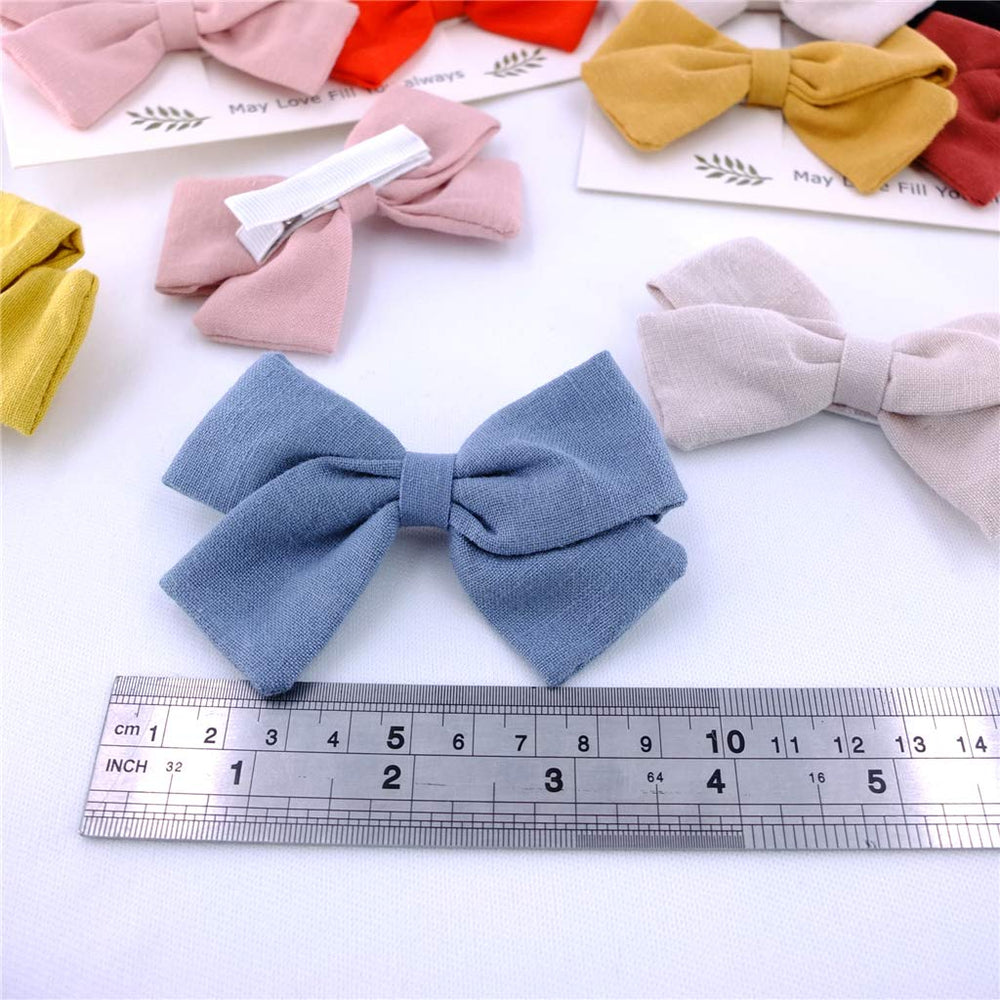 Bailey blue linen bow clip, soft color coordinate for looks