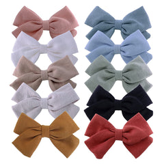 Bailey linen bow clip in white, gentle on fine hair and easy to pair with outfits