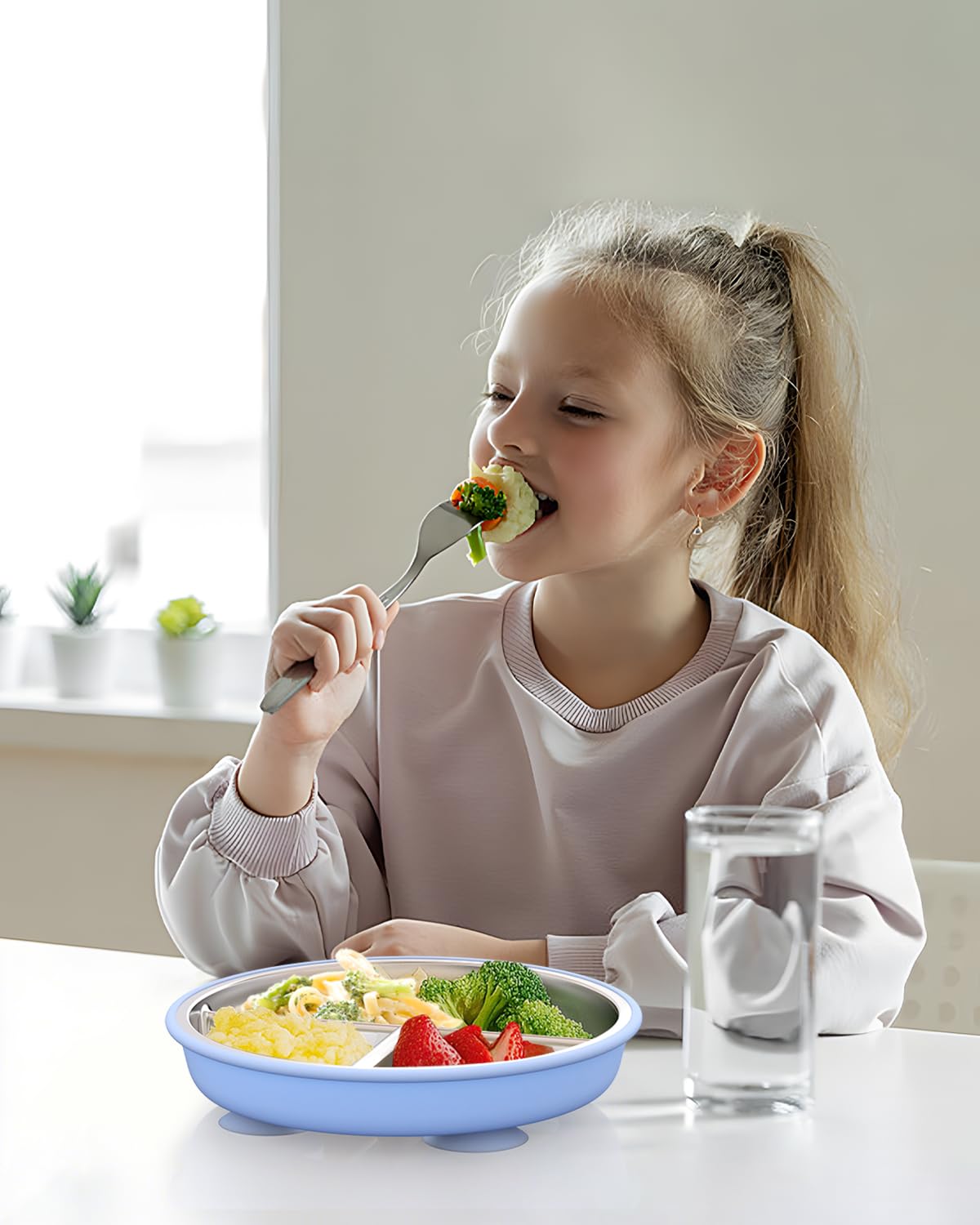 Dishwasher-safe Bakpoco plate; smooth stainless surface resists stains.