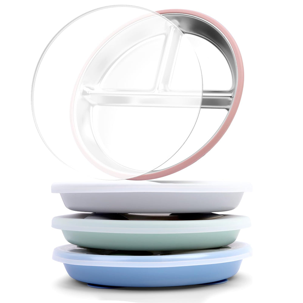 Bakpoco stainless steel toddler suction plate with lid on a tray, spill-reducing design.