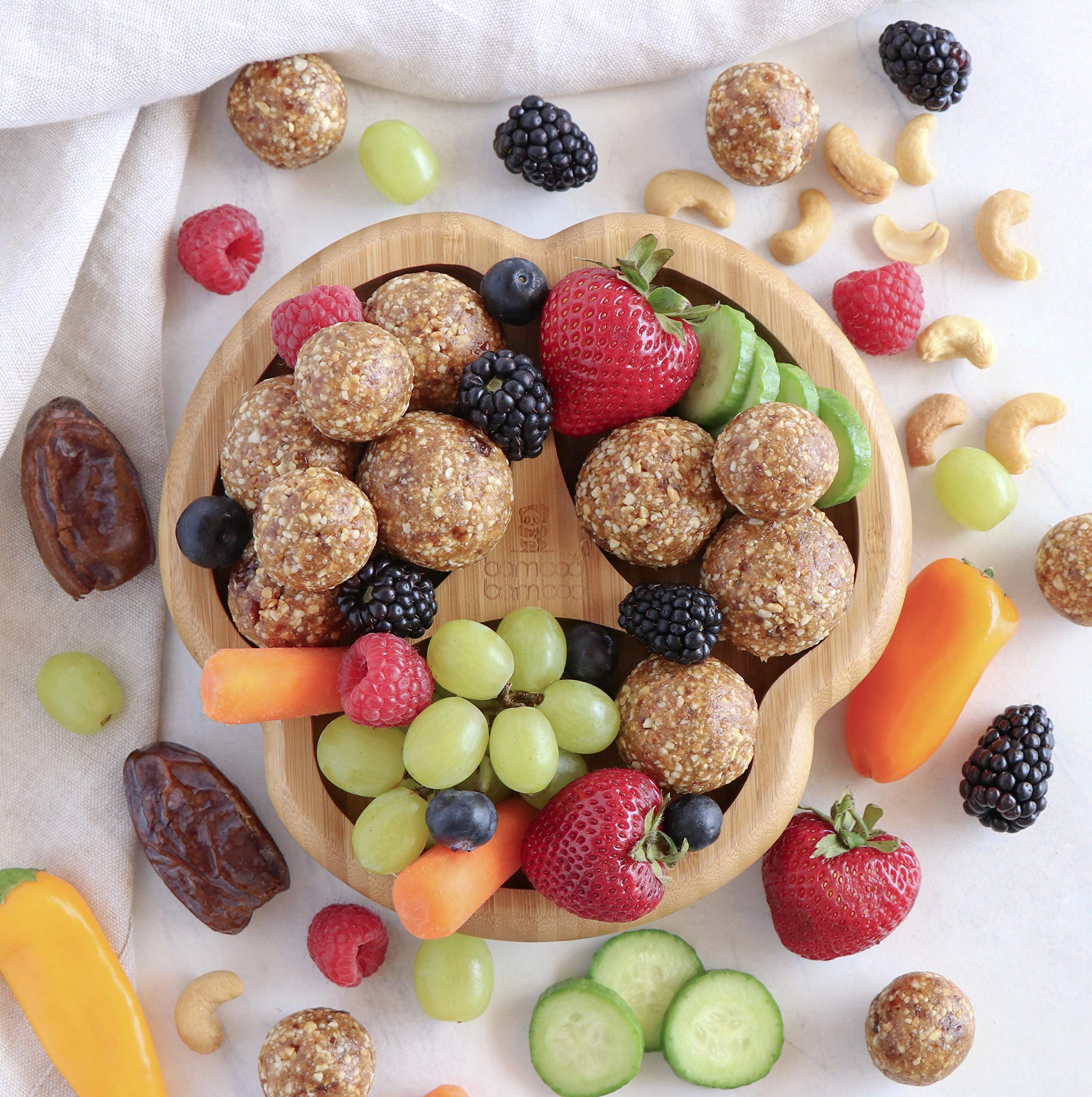Bamboo Baby Divider Plate suction base secures plate to a smooth surface for mess-free meals.