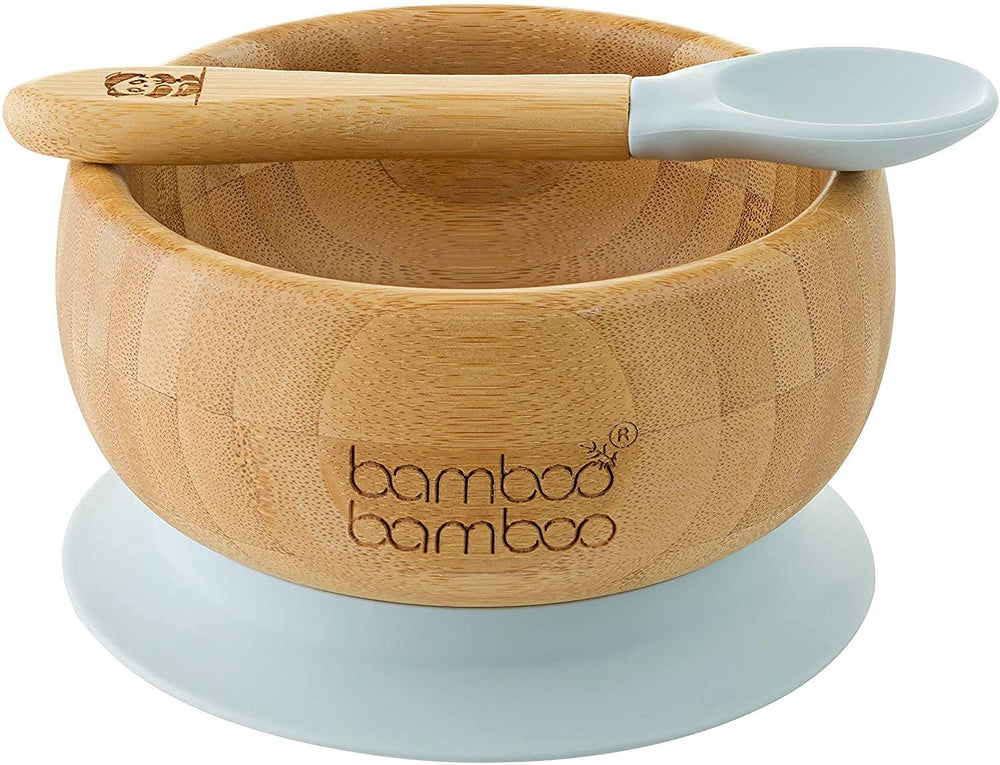 bamboo bamboo bowl and spoon set with suction ring for mess-free self-feeding.